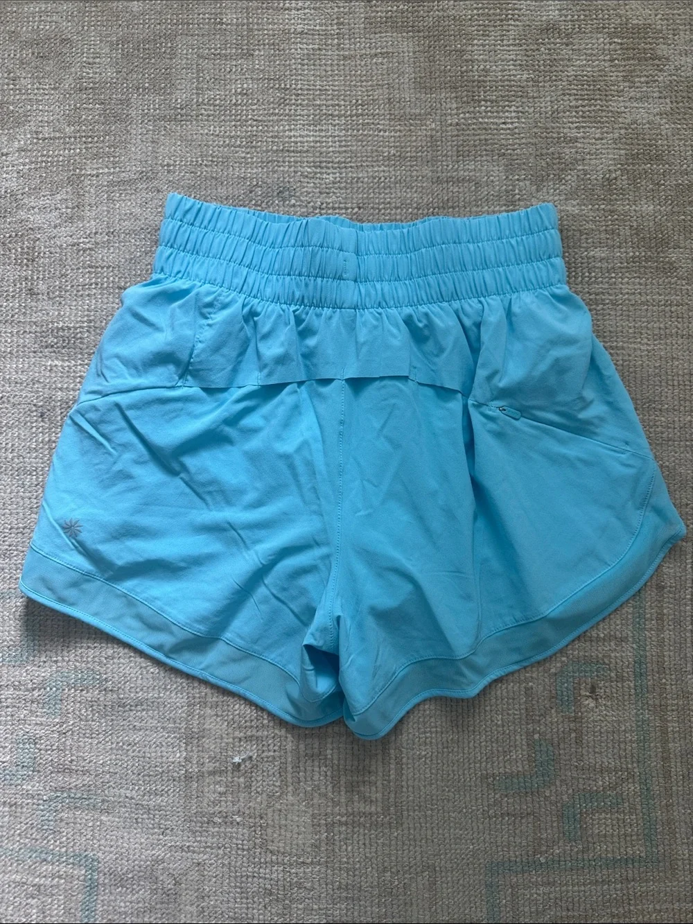 Athleta 3” light blue running shorts